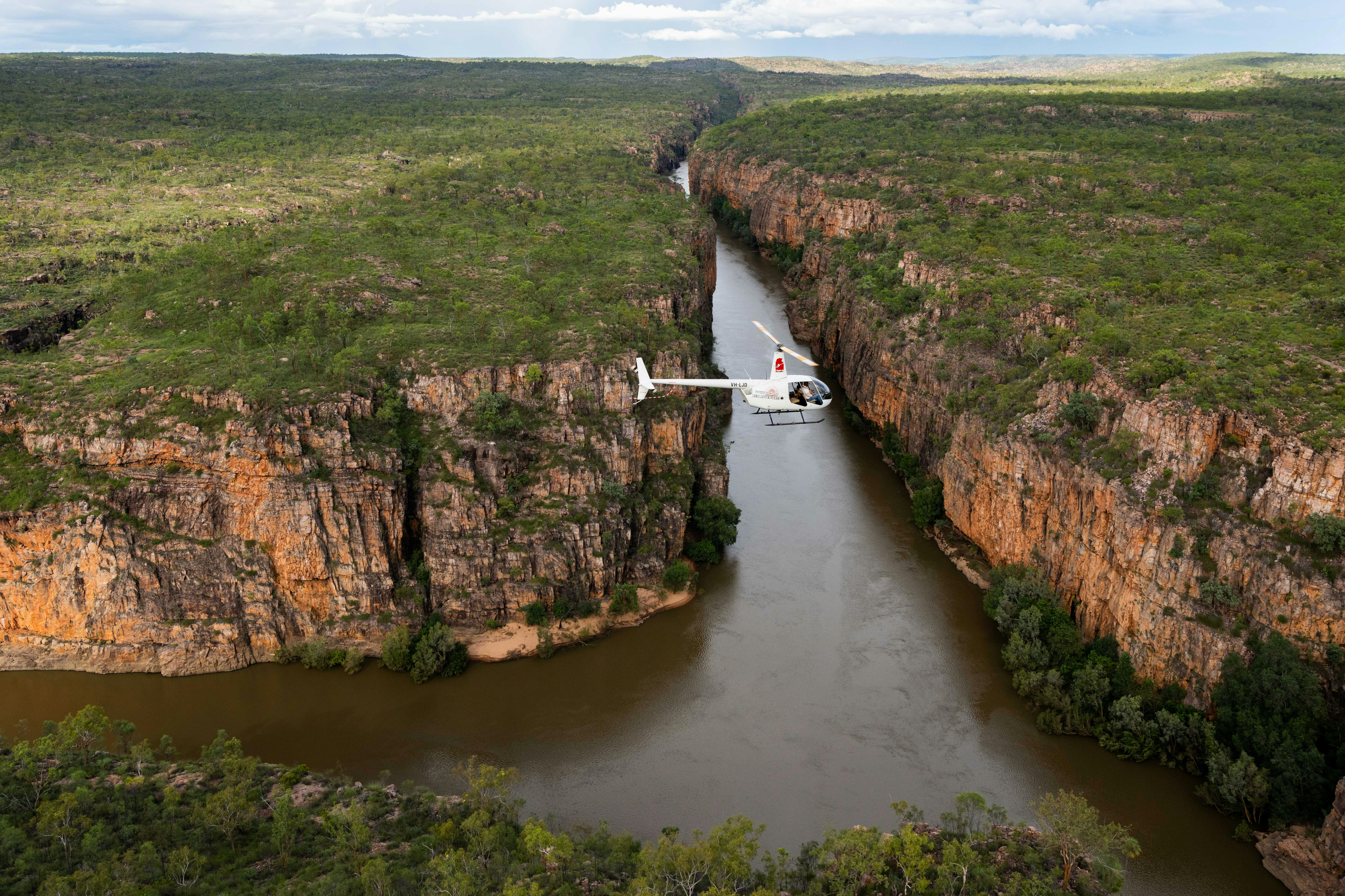 helicopter flying over Nitmiluk Gorge