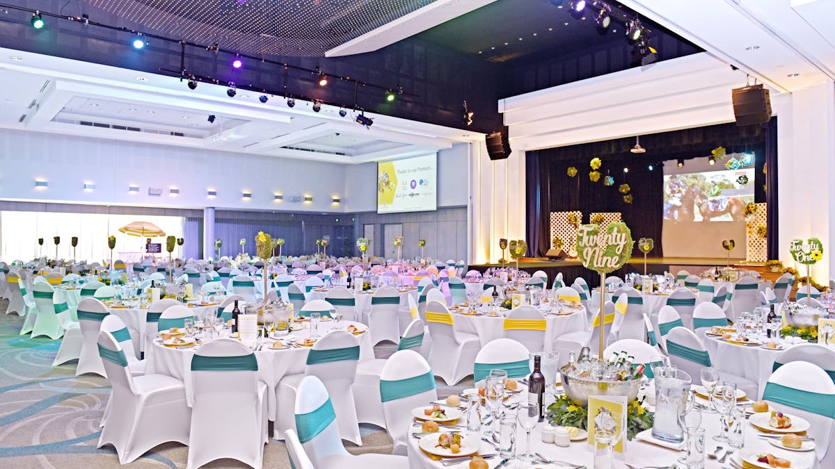 A gala lunch decorated with blue, white and gold theming