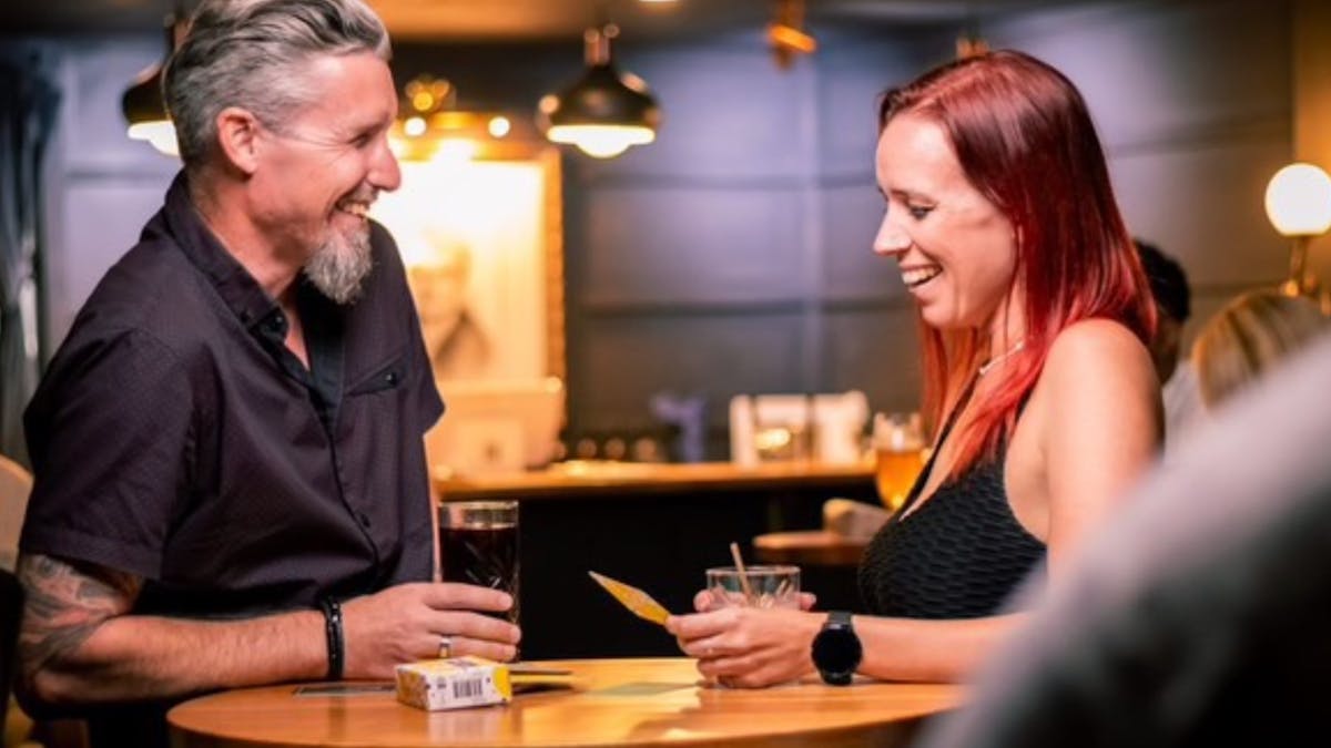 Couple enjoying a drink together