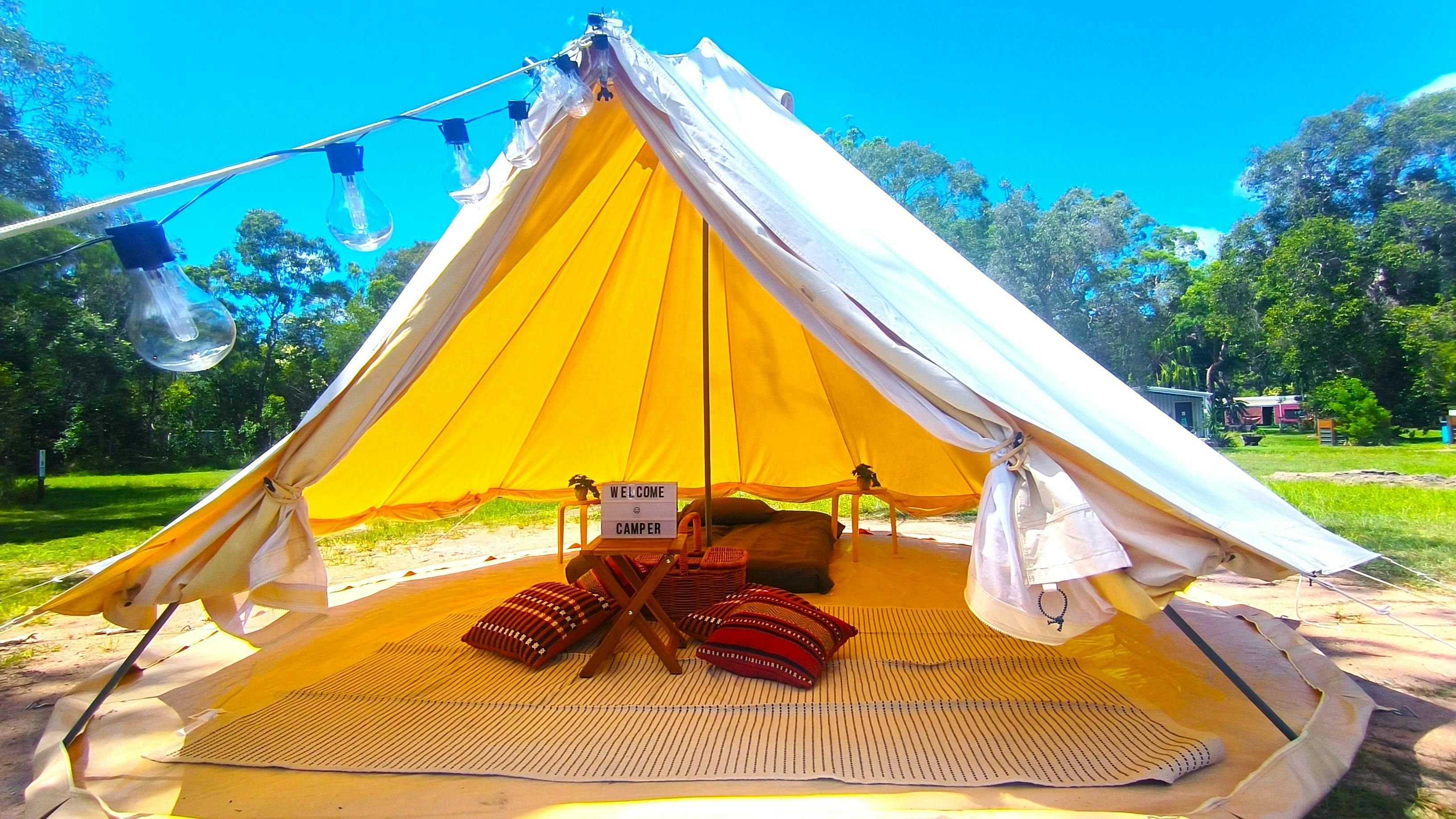 Bell tent with the skirts up, letting the breeze through