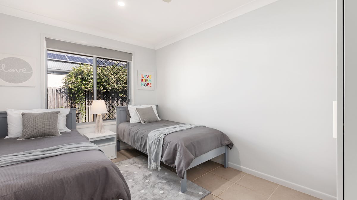 The fourth bedroom near master with ceiling fan