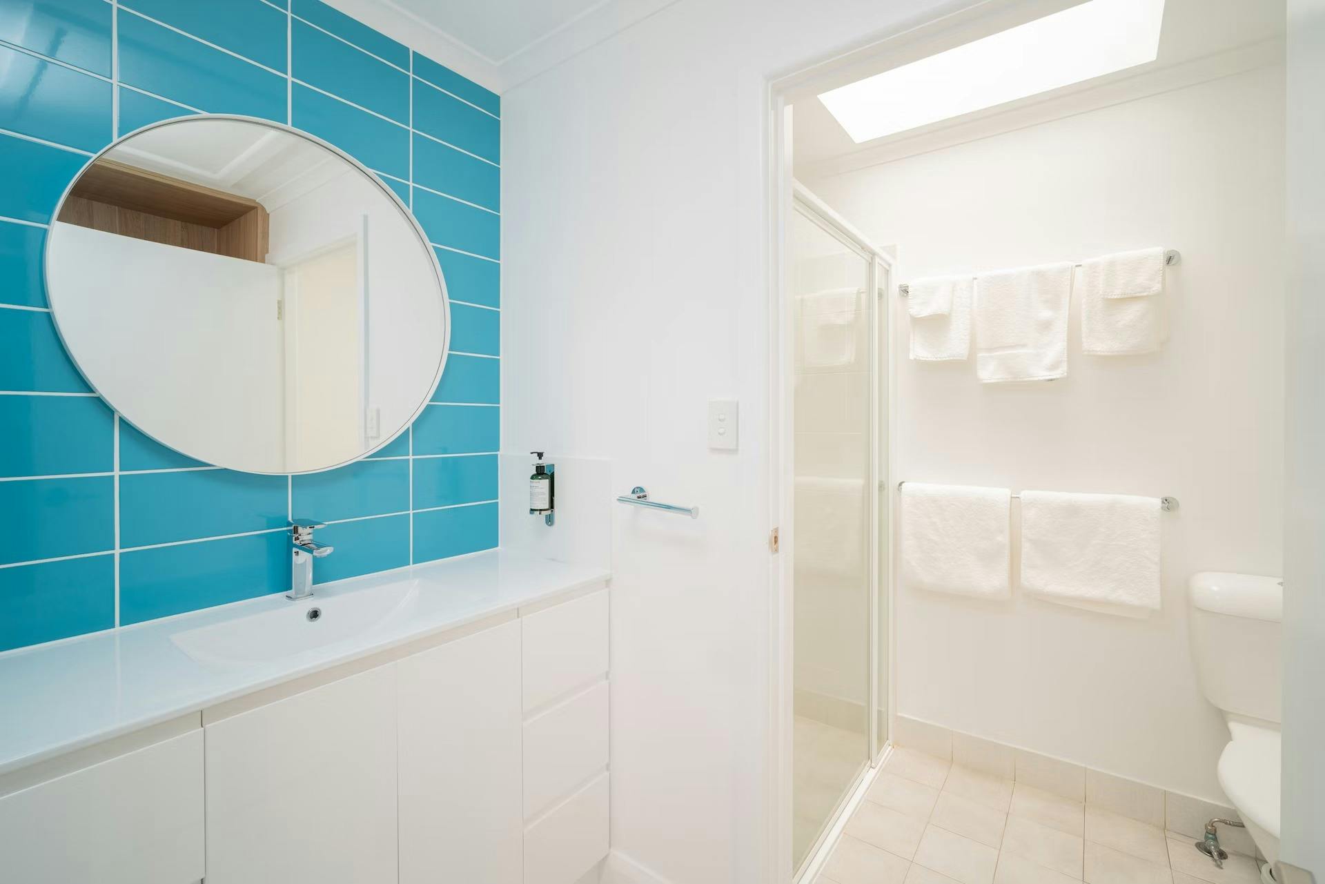 Bathroom with walk in shower and seperate basin