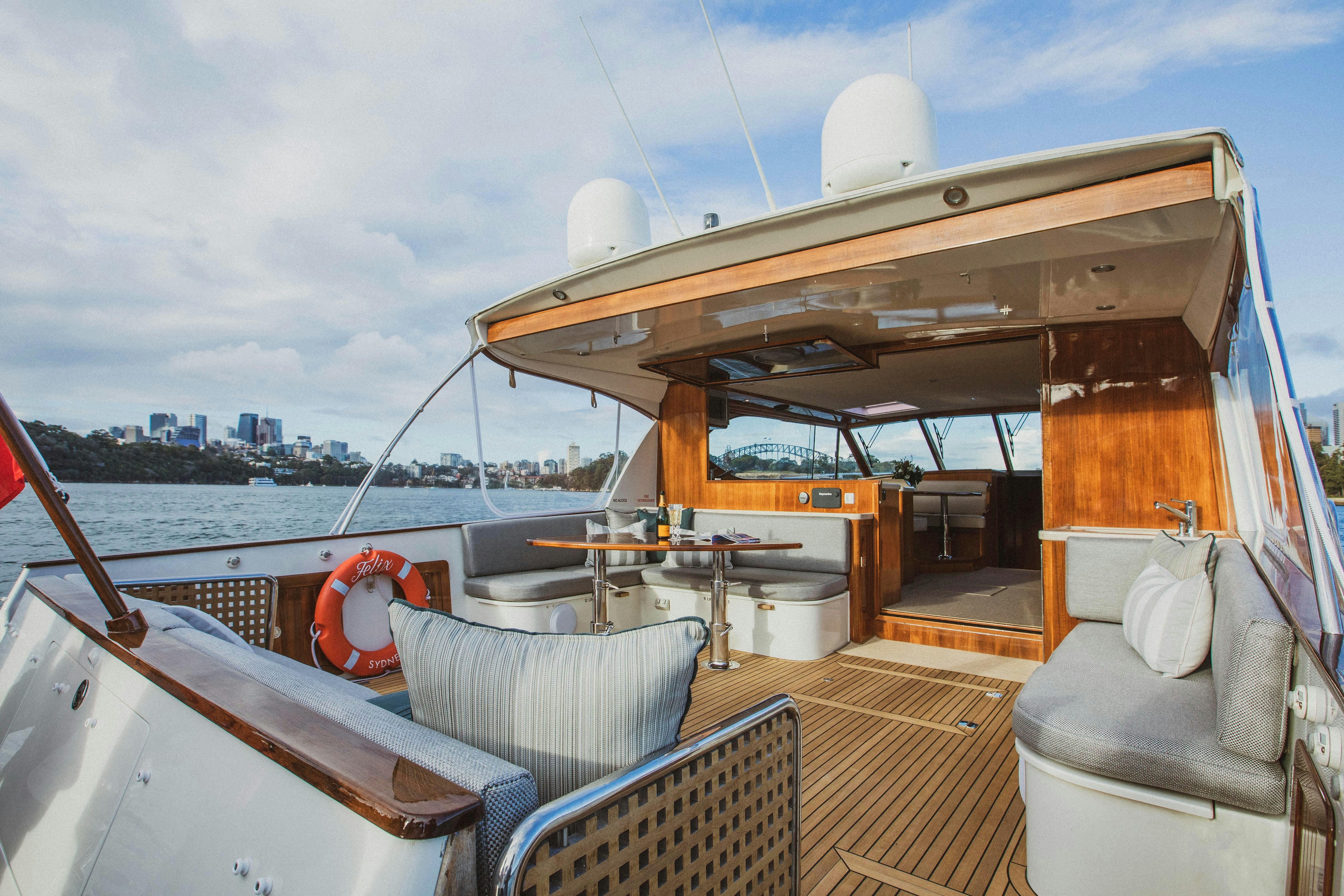 charter boat on sydney harbour back deck