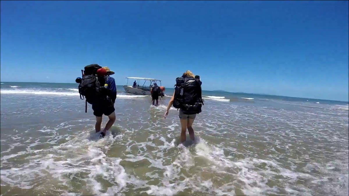 Boarding the ferry to leave Hinchinbrook Island after Thorsborne Trail hike