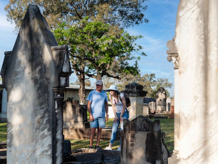 People in graveyard at St Mary Magdalene St Marys