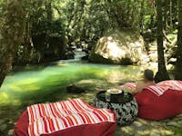 Afternoons relaxing by the swimming hole at Daintree Secrets