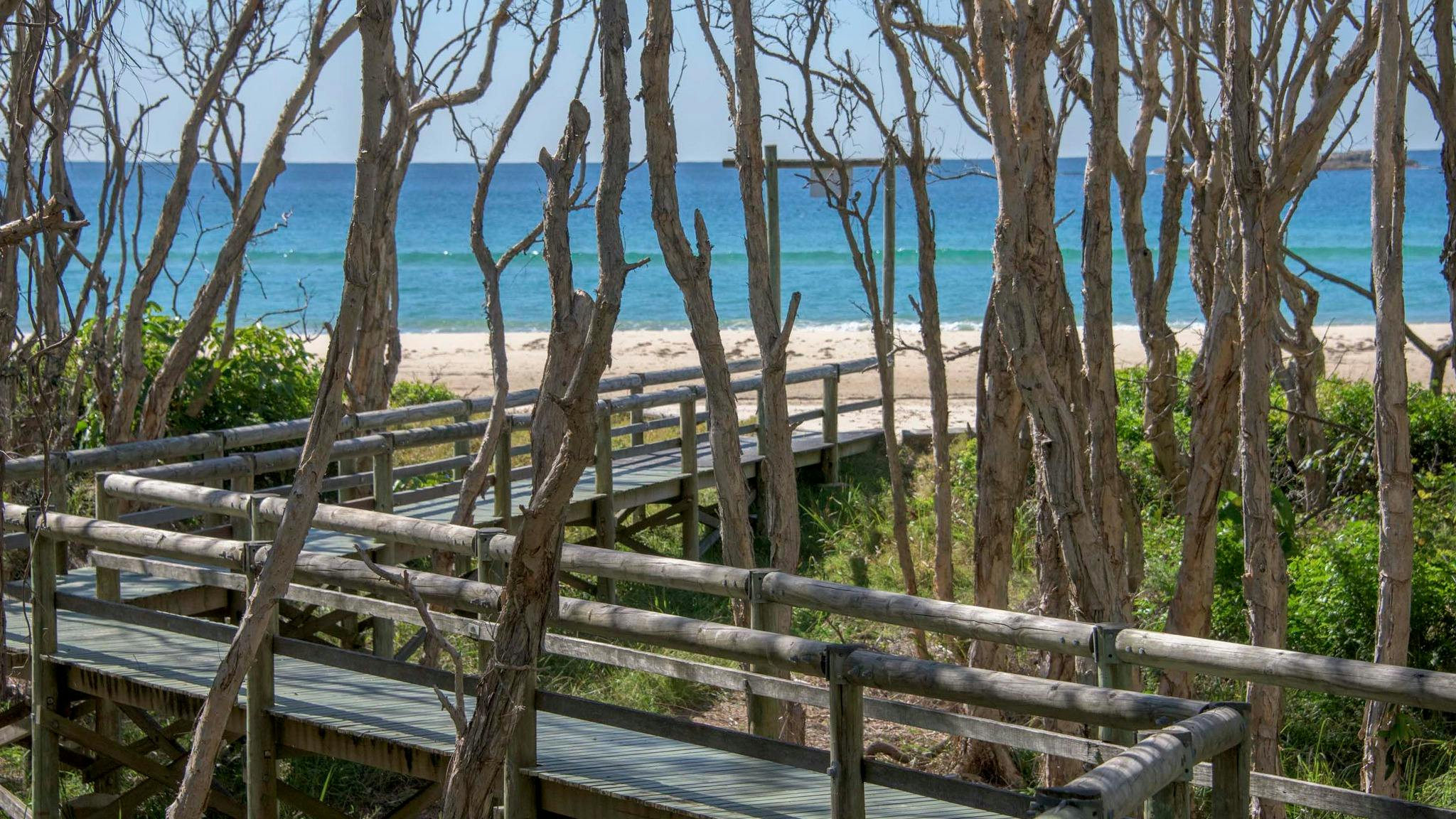 Our private boardwalk leads you onto Home Beach, Point Lookout.