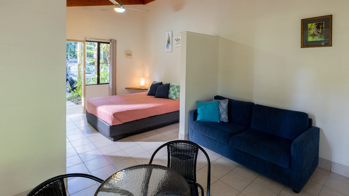 Motel room - queen with bed, sofa and table set