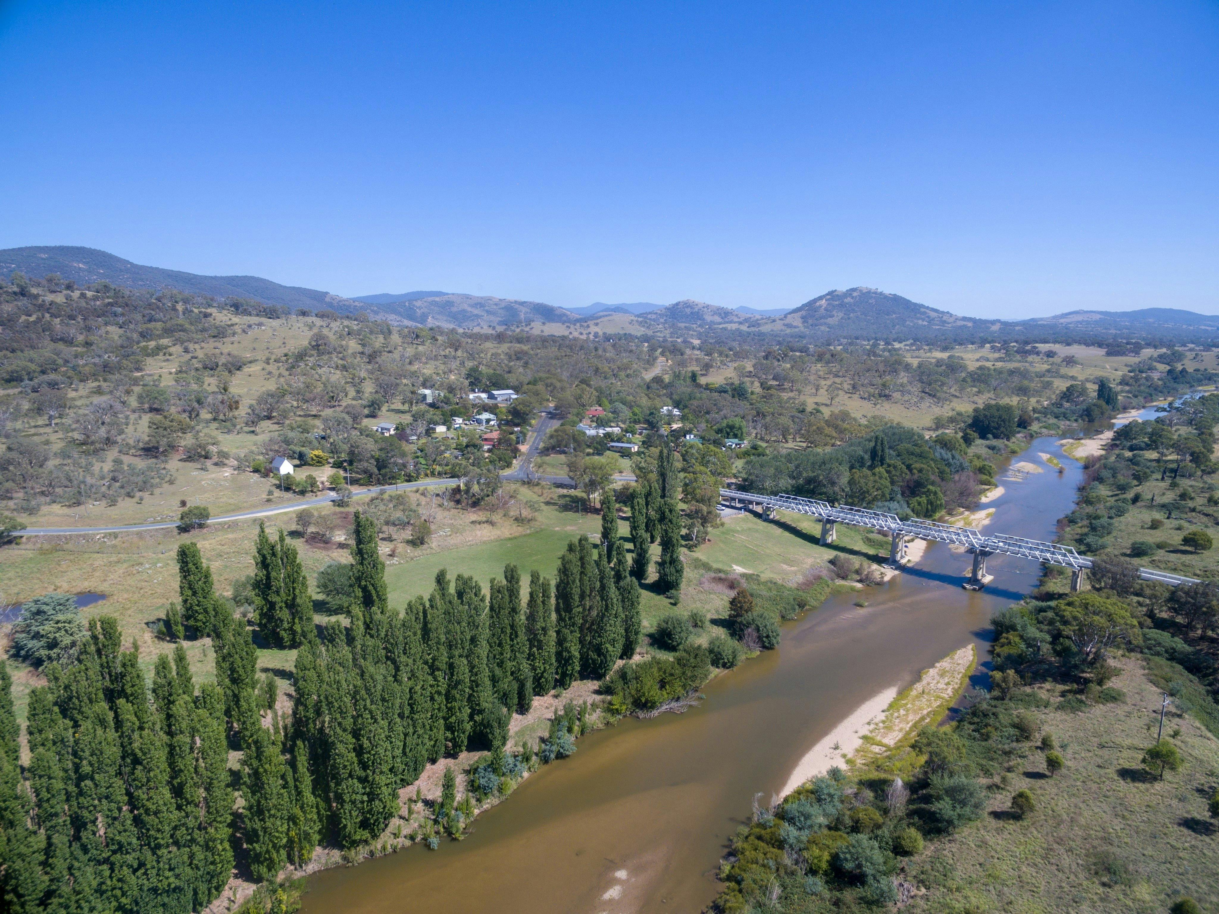 aerial photo of Tharwa Bridge over the Murrumbidgee River