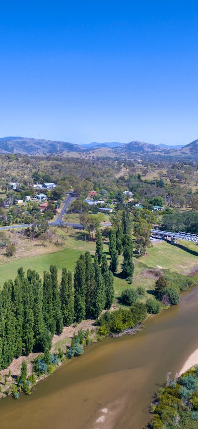 aerial photo of Tharwa Bridge over the Murrumbidgee River