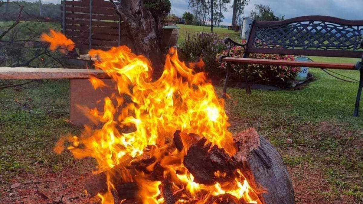 Sit around the outdoor fire pit at the hitching rail retreat in the beautiful nature surrounds