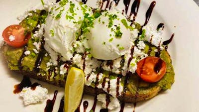 Smashed avo with poached eggs