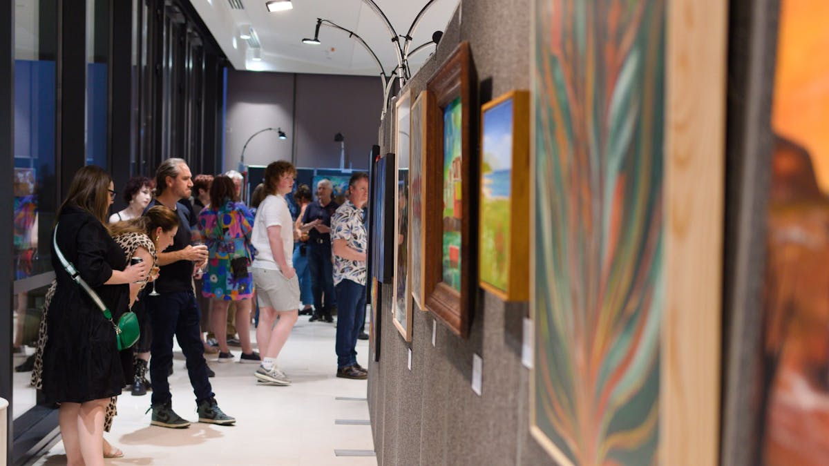 People looking at art