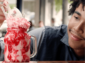 Man appreciating his FreakShake ™