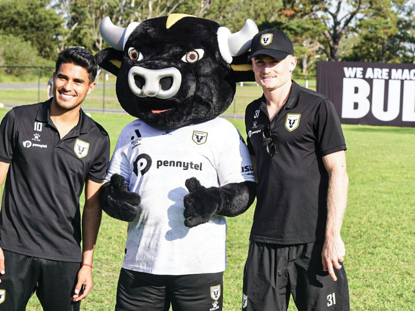 Macarthur FC Bulls mascot with two players