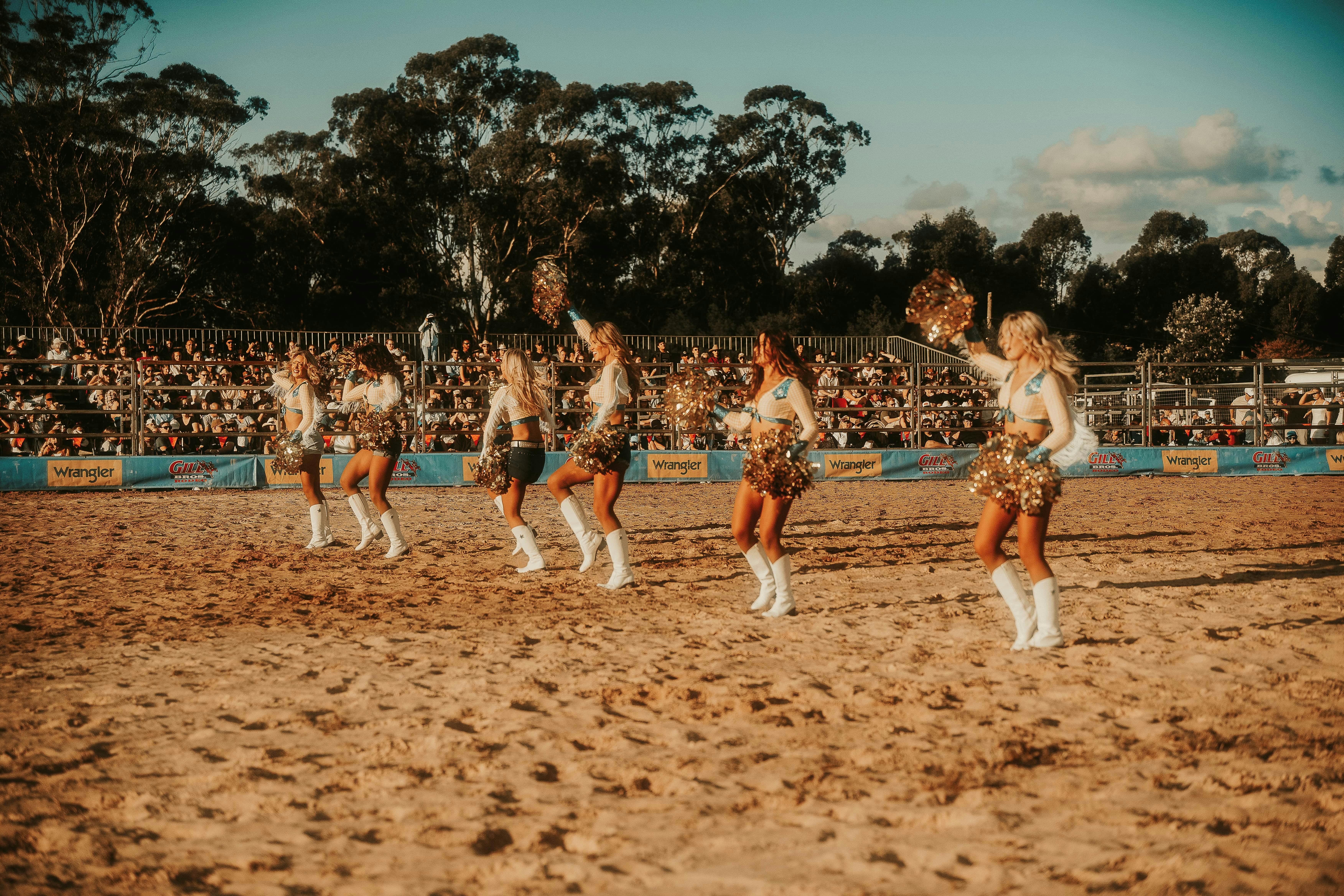A group of 6 cheerleaders entertain the sold out crowd at Sydney Rodeo