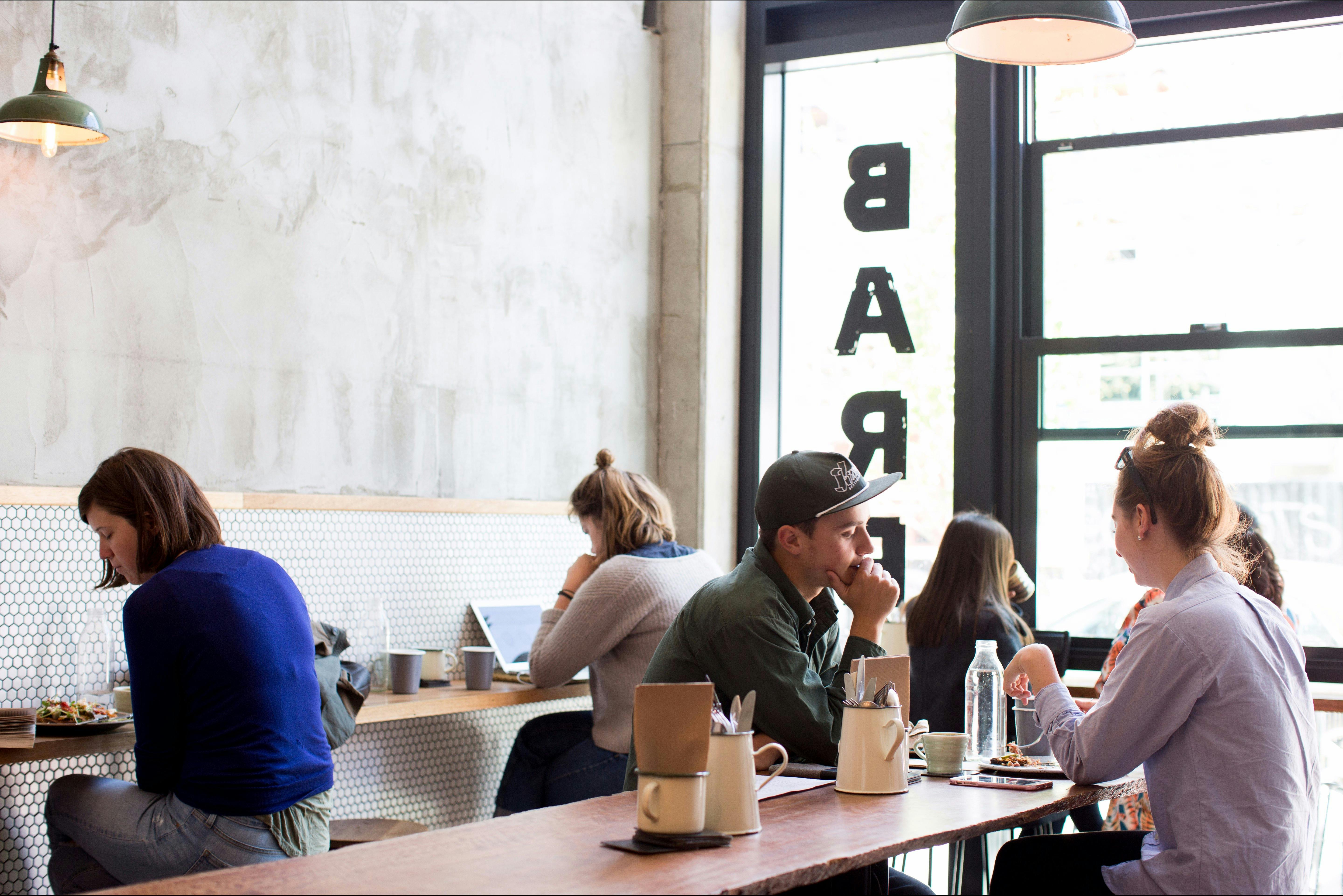 People relaxing in the coffee bar