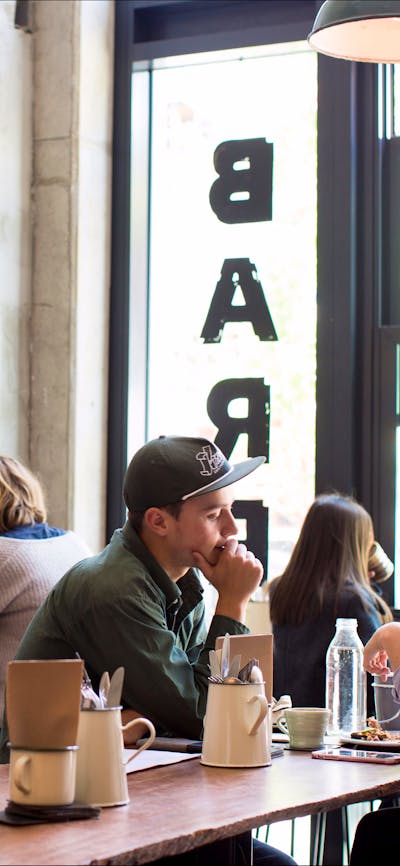 People relaxing in the coffee bar