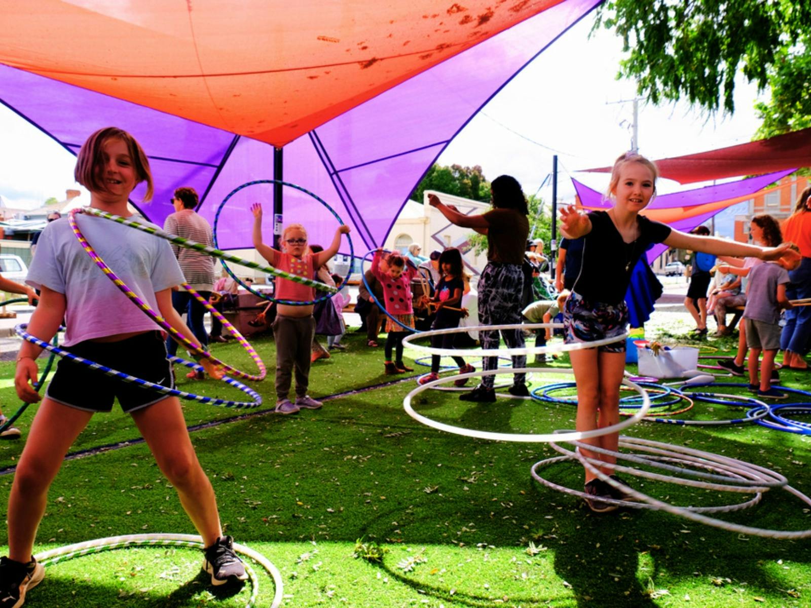 Group of kids playing with hula hoops