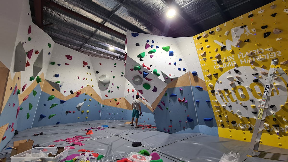 One of Wall Walkers Bouldering setters testing and thinking about his new route on "Wave"
