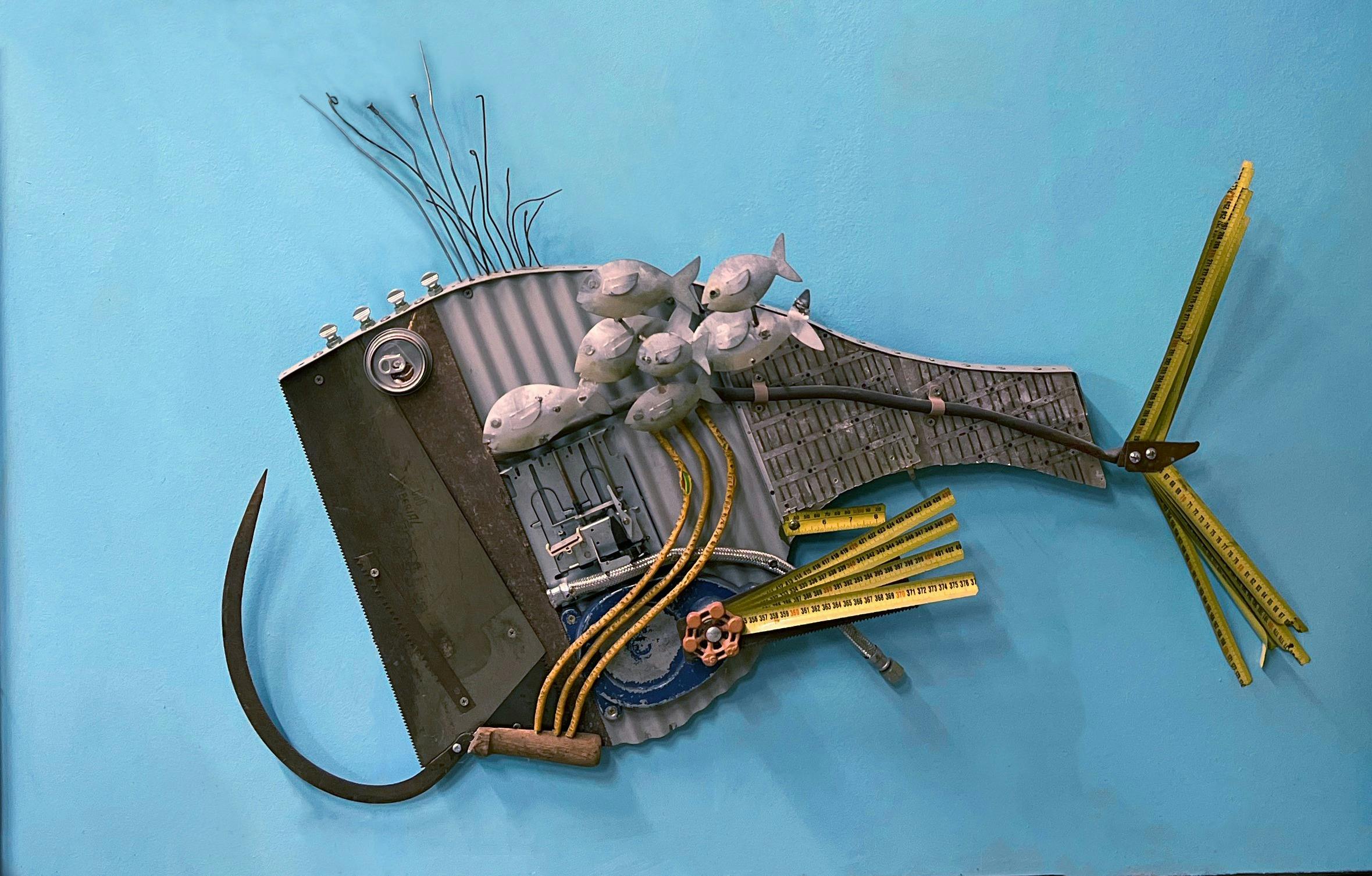 Fish sculpture by Robert Liston, Corrugated Crab Catcher with passing school, mixed media.