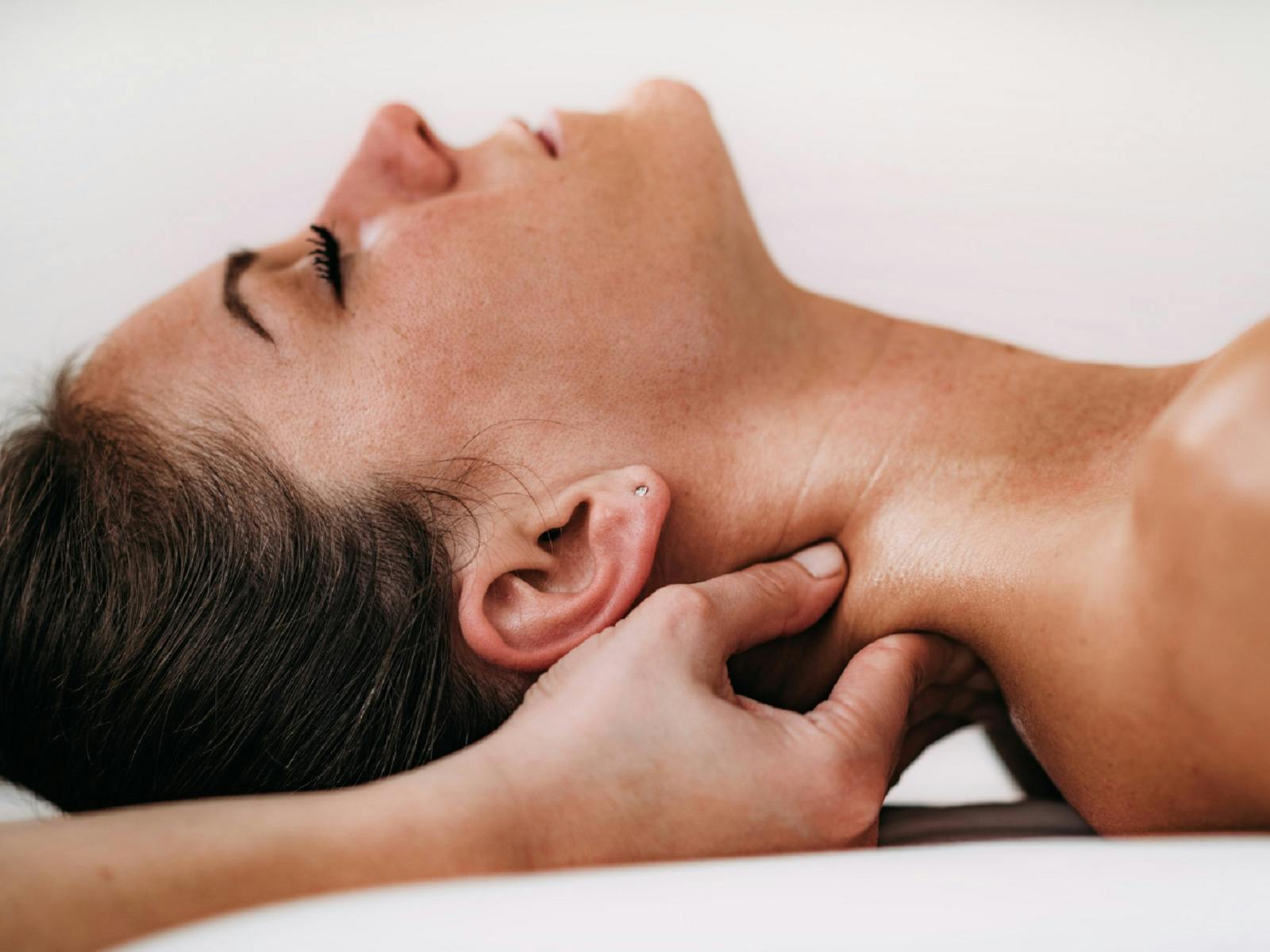 Woman having spinal flow treatment