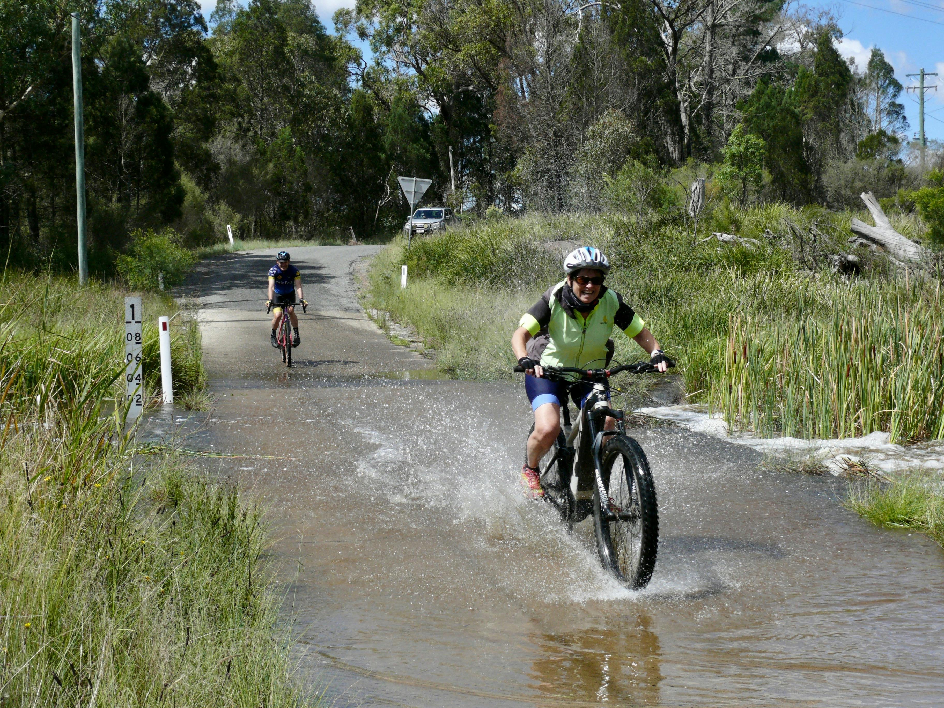 Water crossing. Watersplash on a bike. Wet feet. Live, laugh, ride. Smiles per Hour