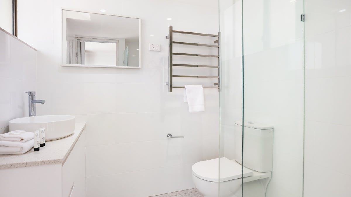 Main ensuite with shower, vanity, sink, toilet - Seacrest Apartments Surfers Paradise Gold Coast