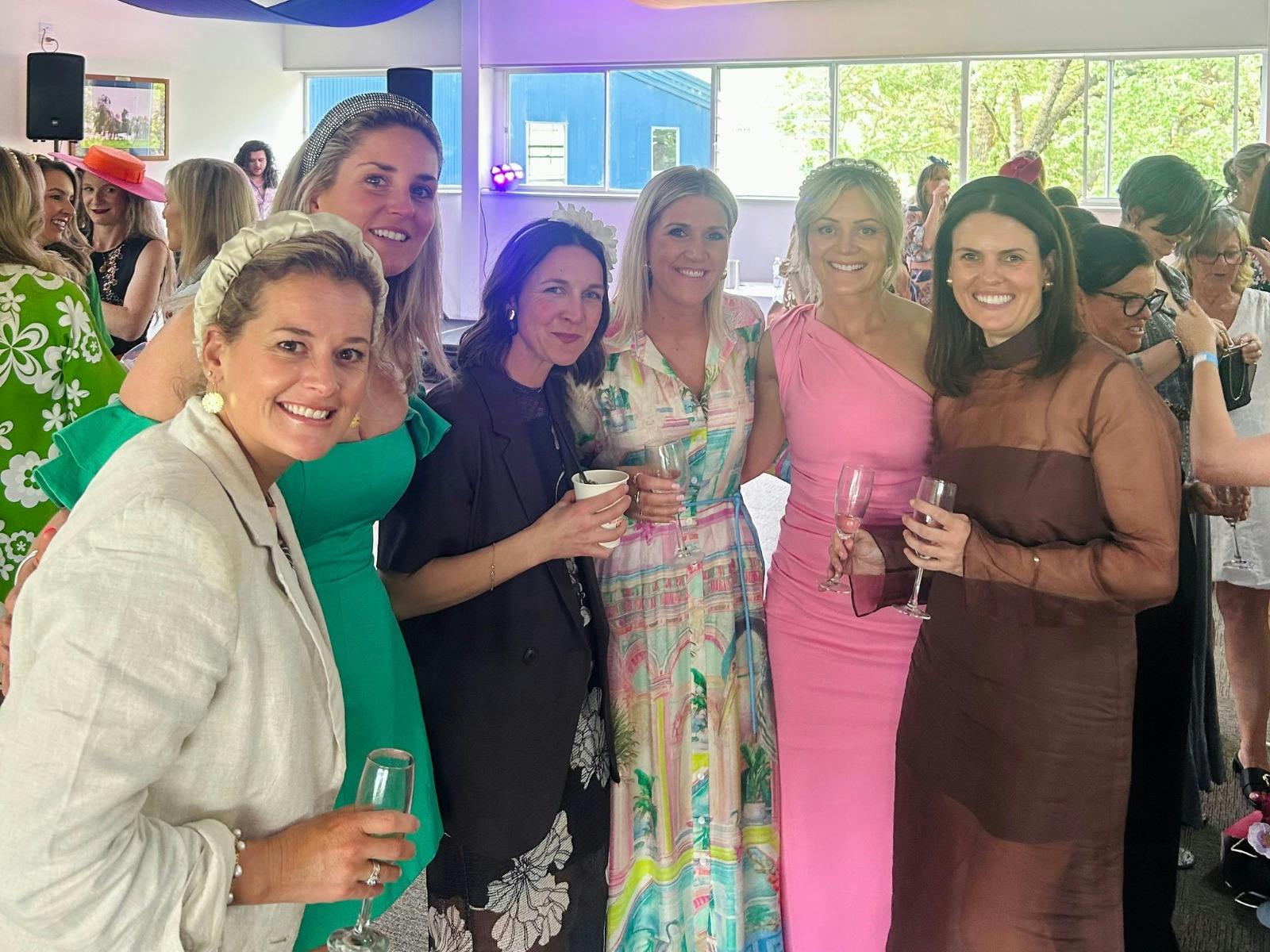 Ladies smiling for a photo at the 2025 Power FM Ladies Day