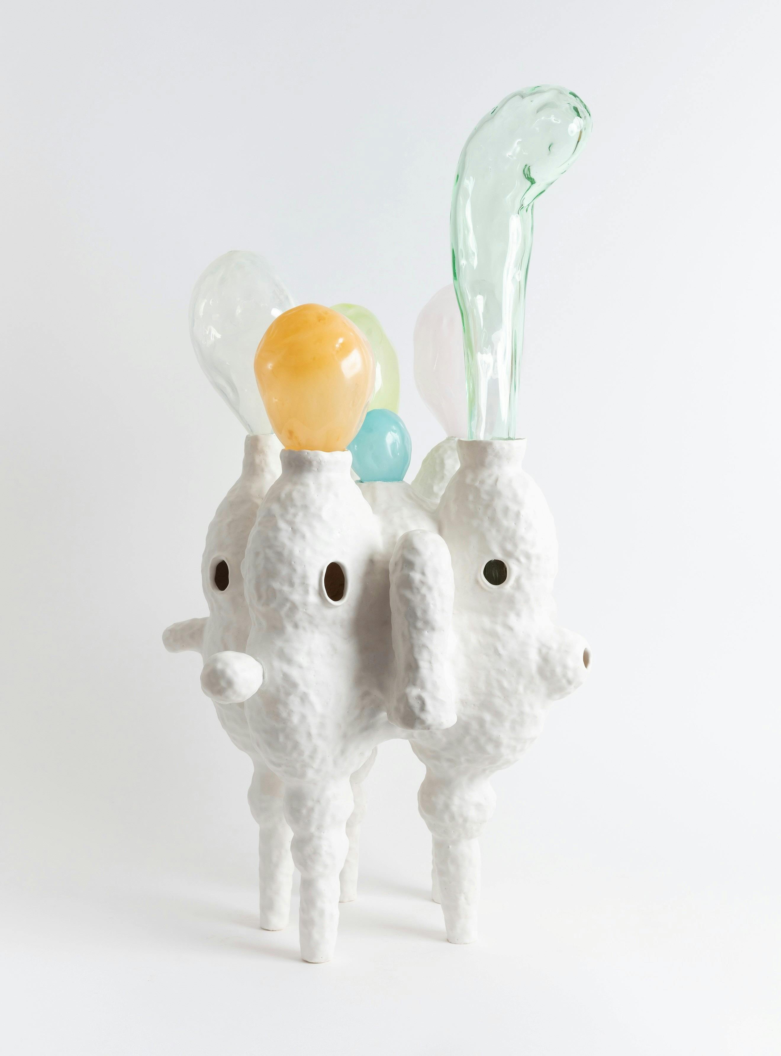Lynda Draper artwork, made of glazed ceramic and studio blown glass, on white background