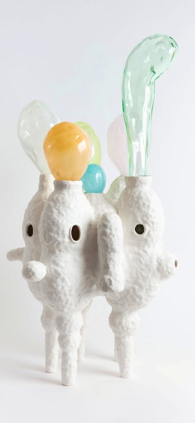 Lynda Draper artwork, made of glazed ceramic and studio blown glass, on white background