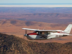 Chinta Air, the scenic flight specialists, flying above Wilpena Pound.