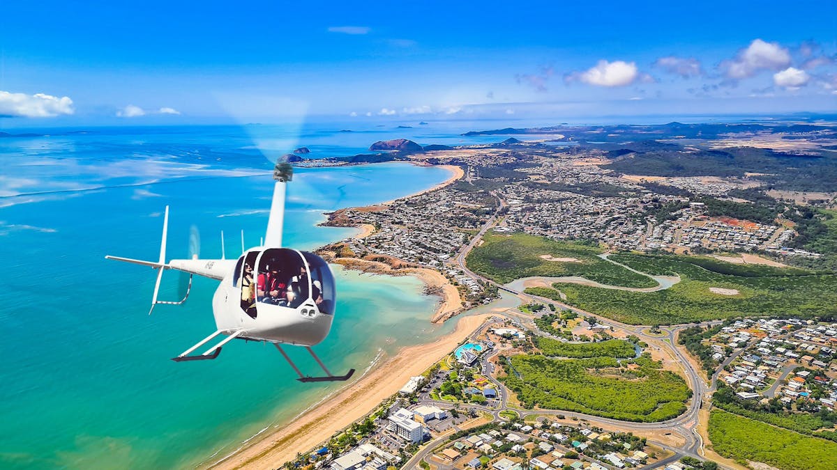 Photo of helicopter flying over Capricorn Coast