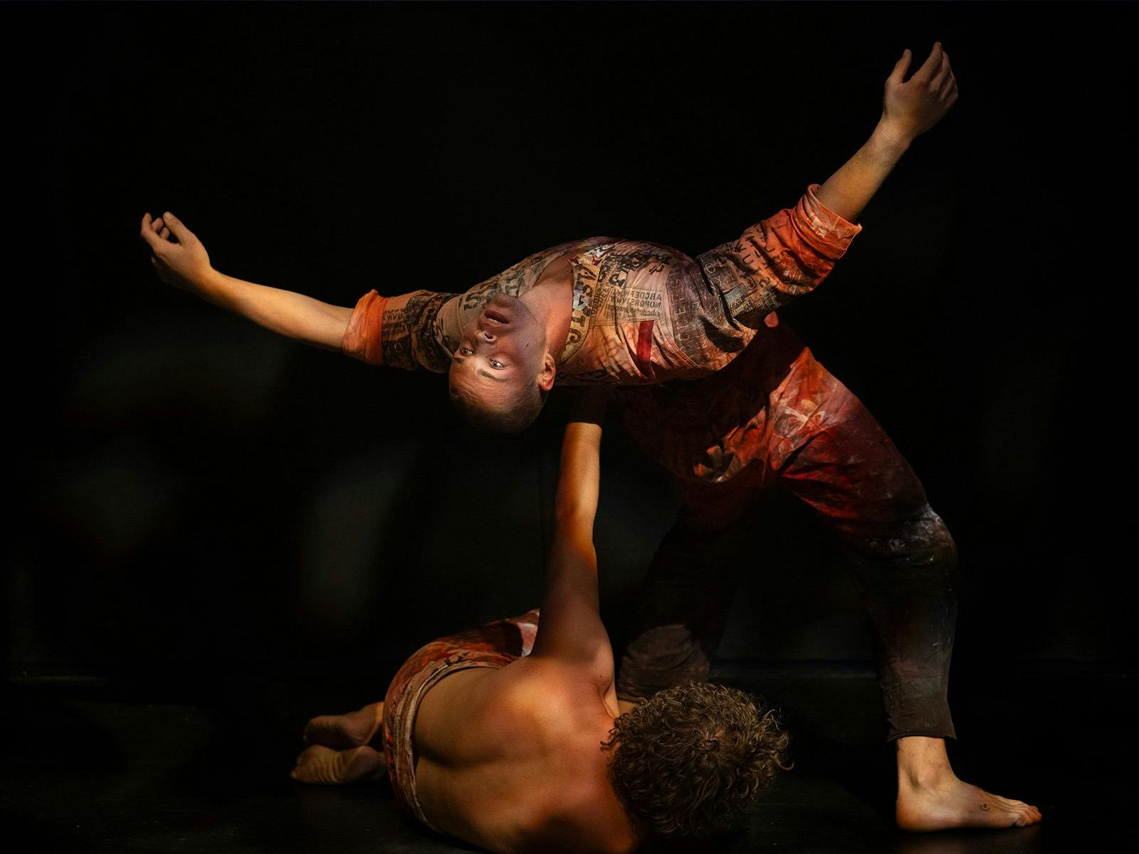 In the style of a classical painting two dancers pose