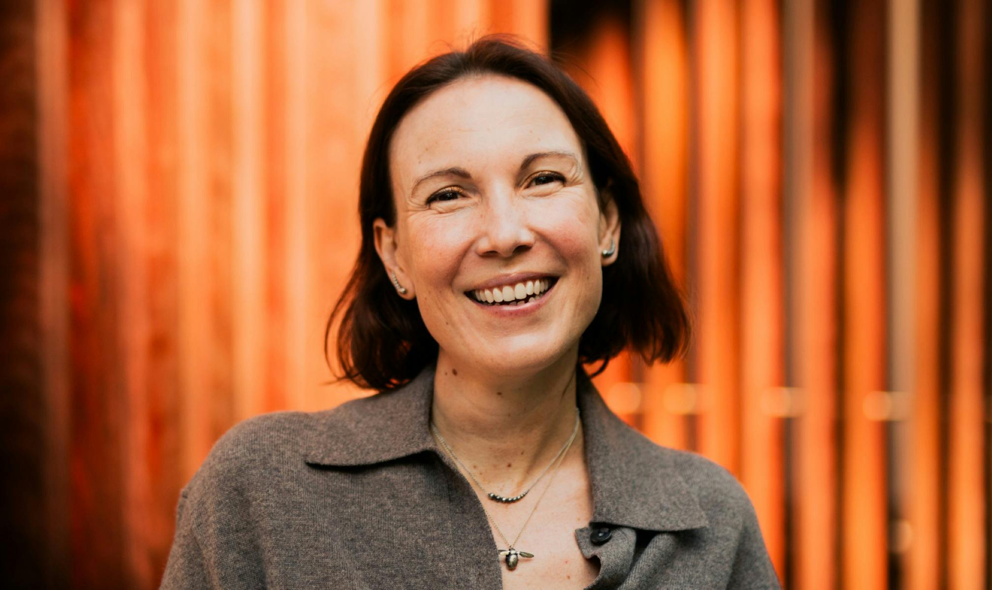 Author Kimberley Allsopp smiling.
