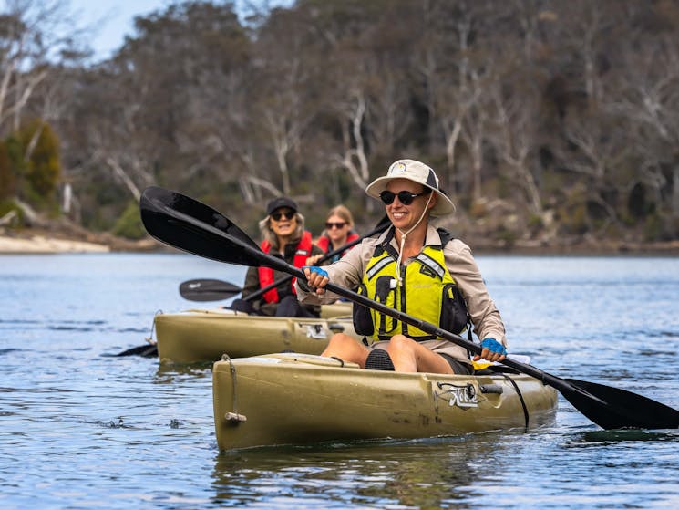Guests and kayak guide along the Pambula River