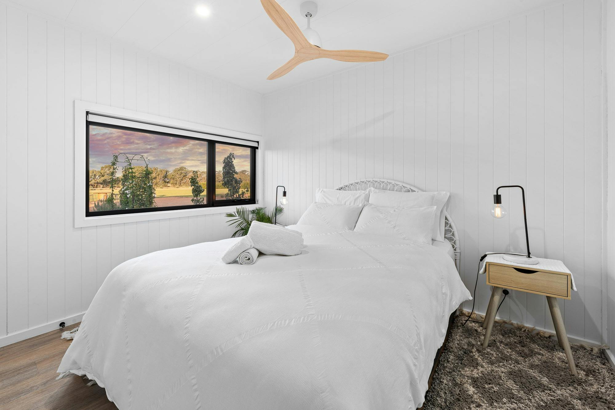 'The Ophir' pristine queen bedroom. Unhindered landscape and night sky views.