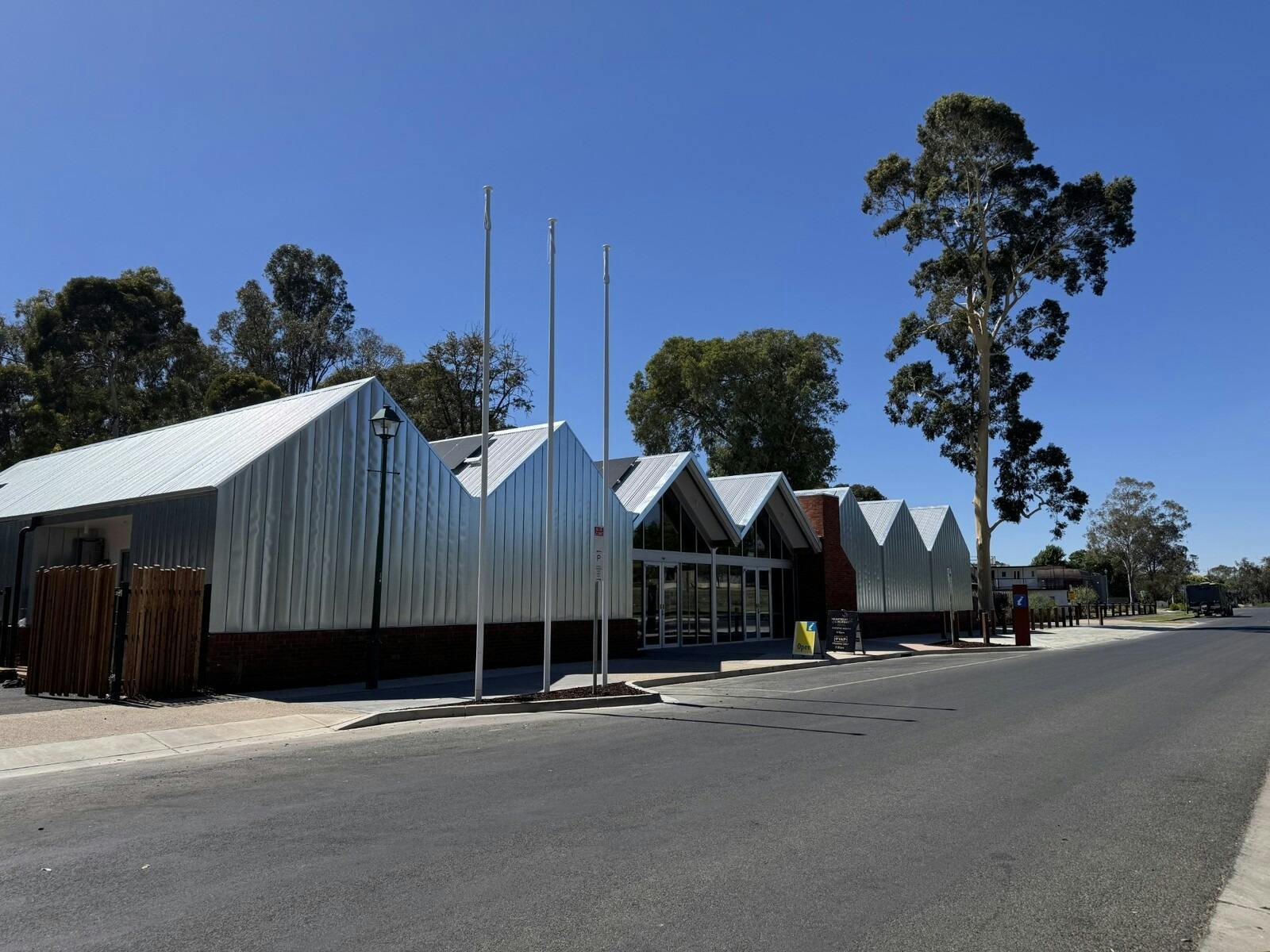 Front Entrance near the road with trees