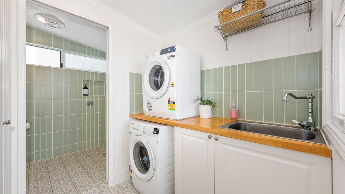 Bathroom 2 has a toilet, vanity and level access shower. Bathroom 2 has a toilet, vanity and level access shower.