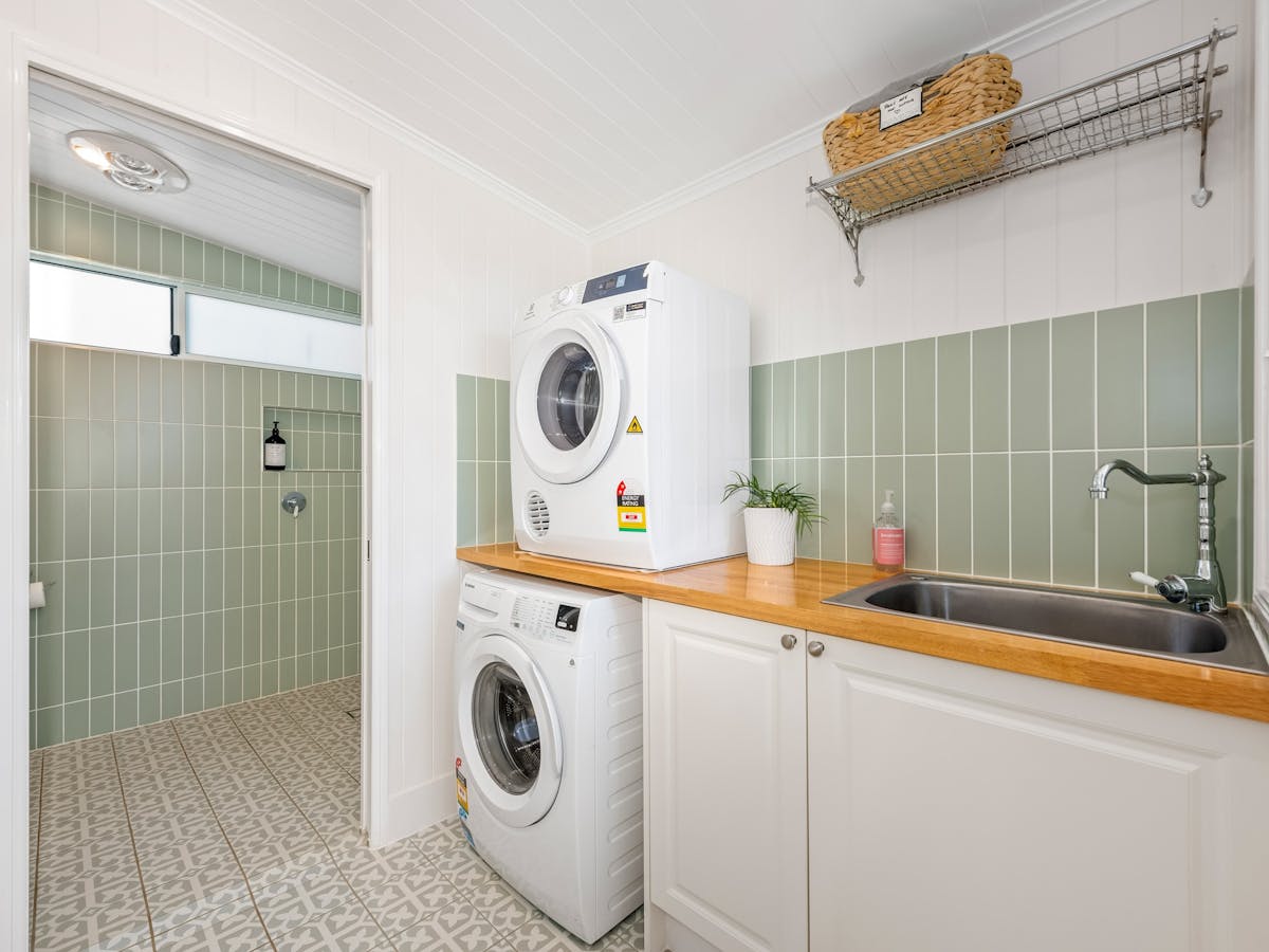 Bathroom 2 has a toilet, vanity and level access shower. Bathroom 2 has a toilet, vanity and level access shower.