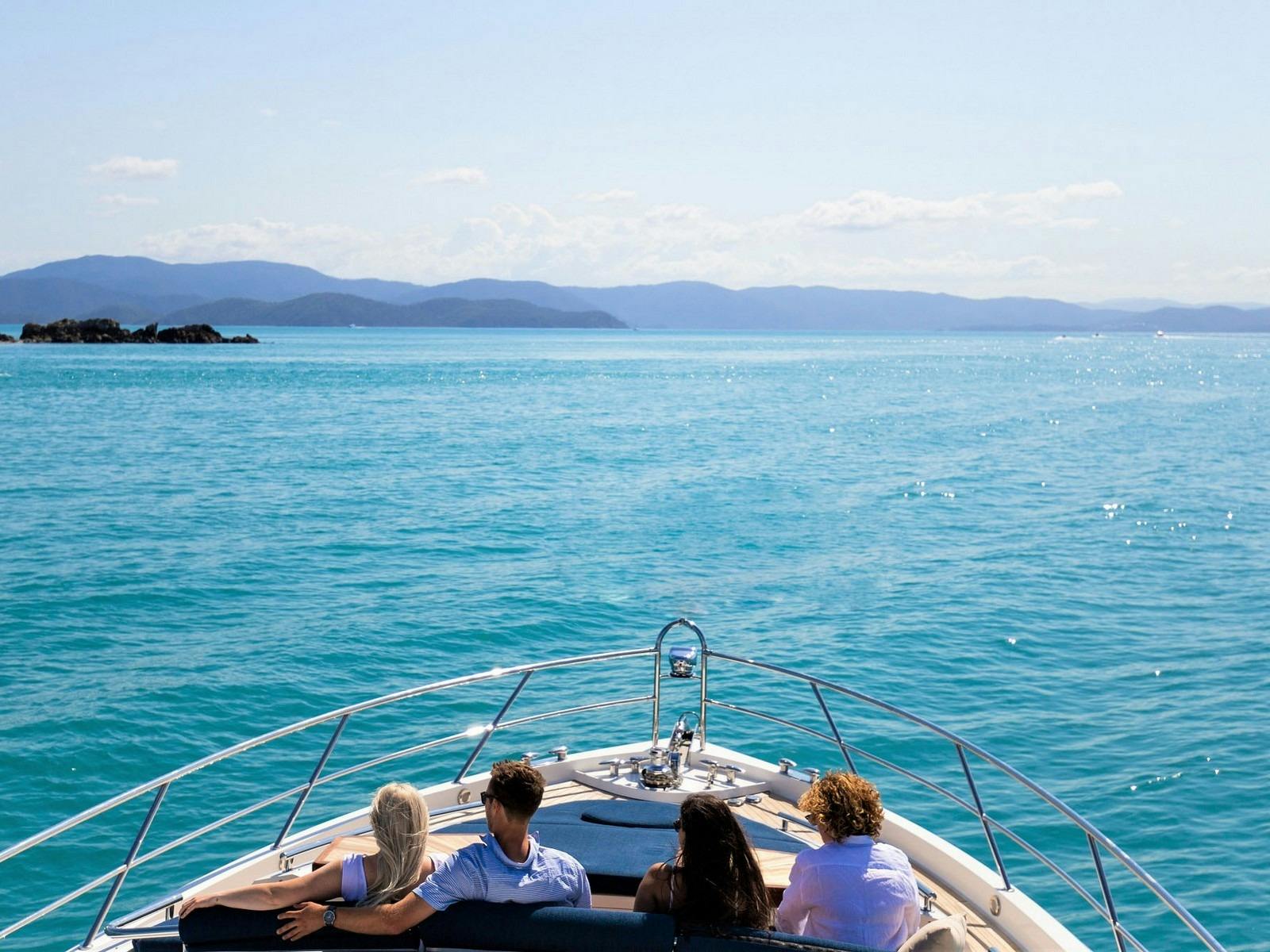 La Mar - People on bow overlooking ocean