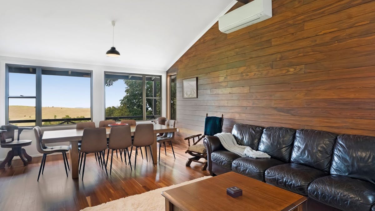 Living room with Smart TV and dining table