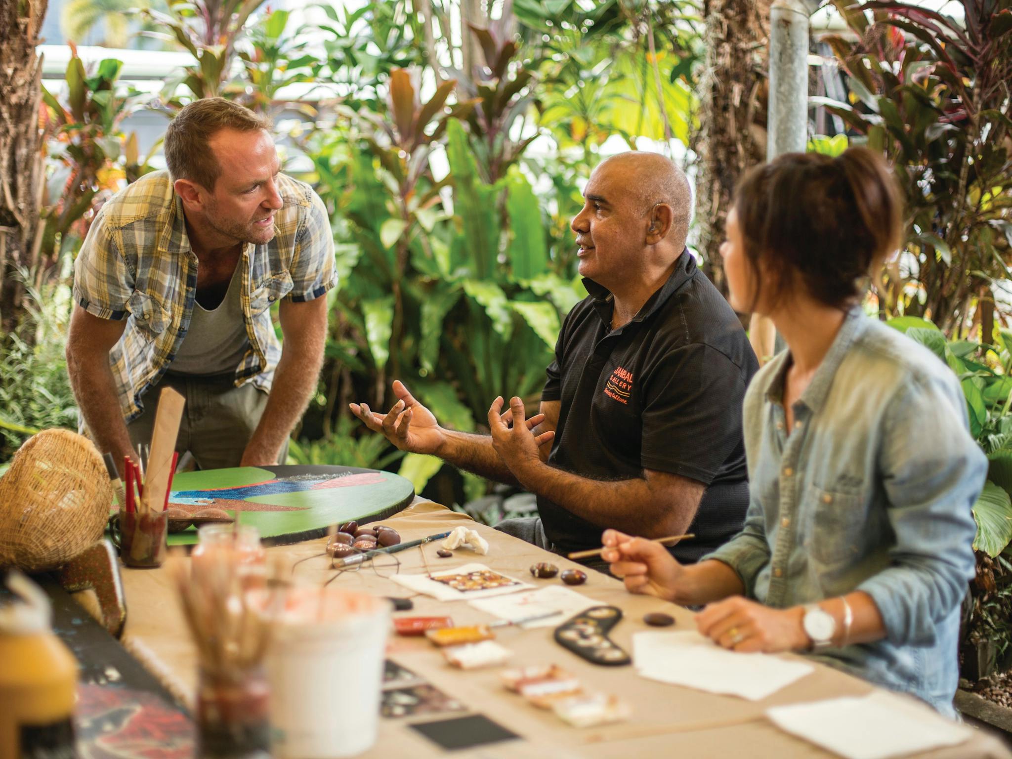 Binna talking about Aboriginal culture with customers Binna talking about Aboriginal culture with customers