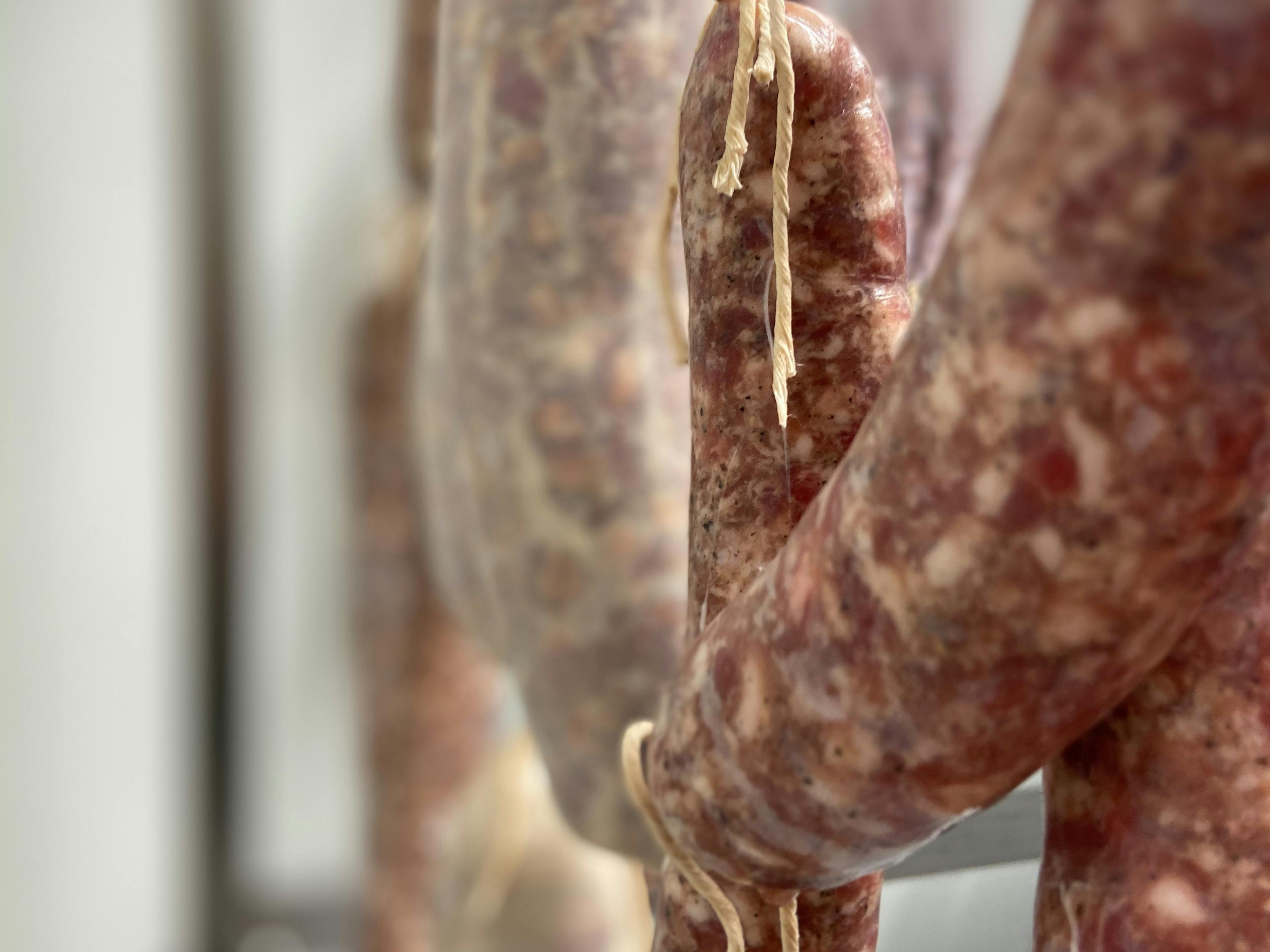 Ethically raised, artisan made, all natural sausages hanging at Fork it Farm