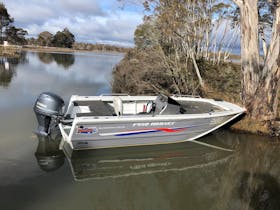 The Highland Fly's boat at the entrance to Penstock Lagoon