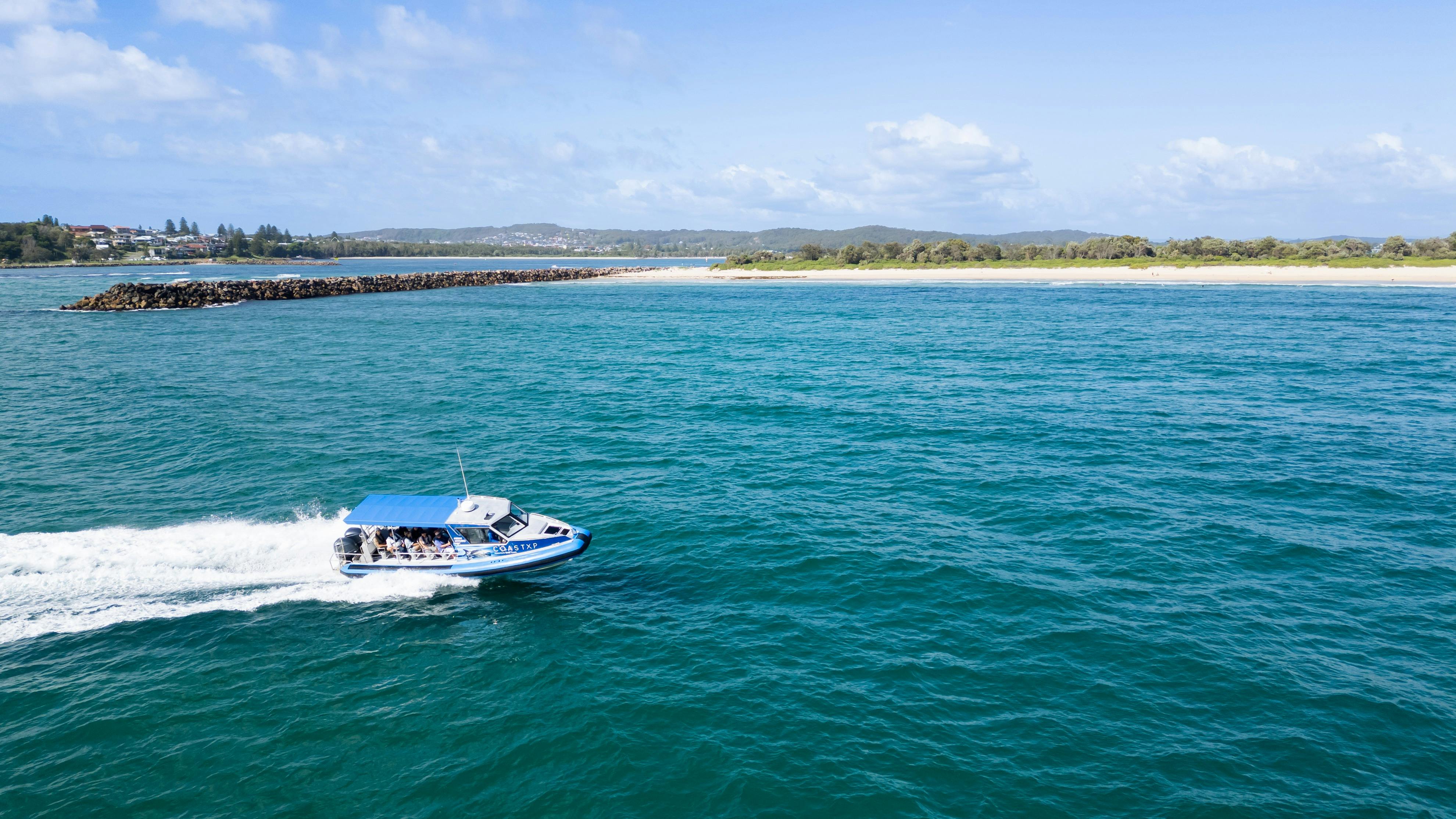 Boat next to Lake Macquarie breakwall