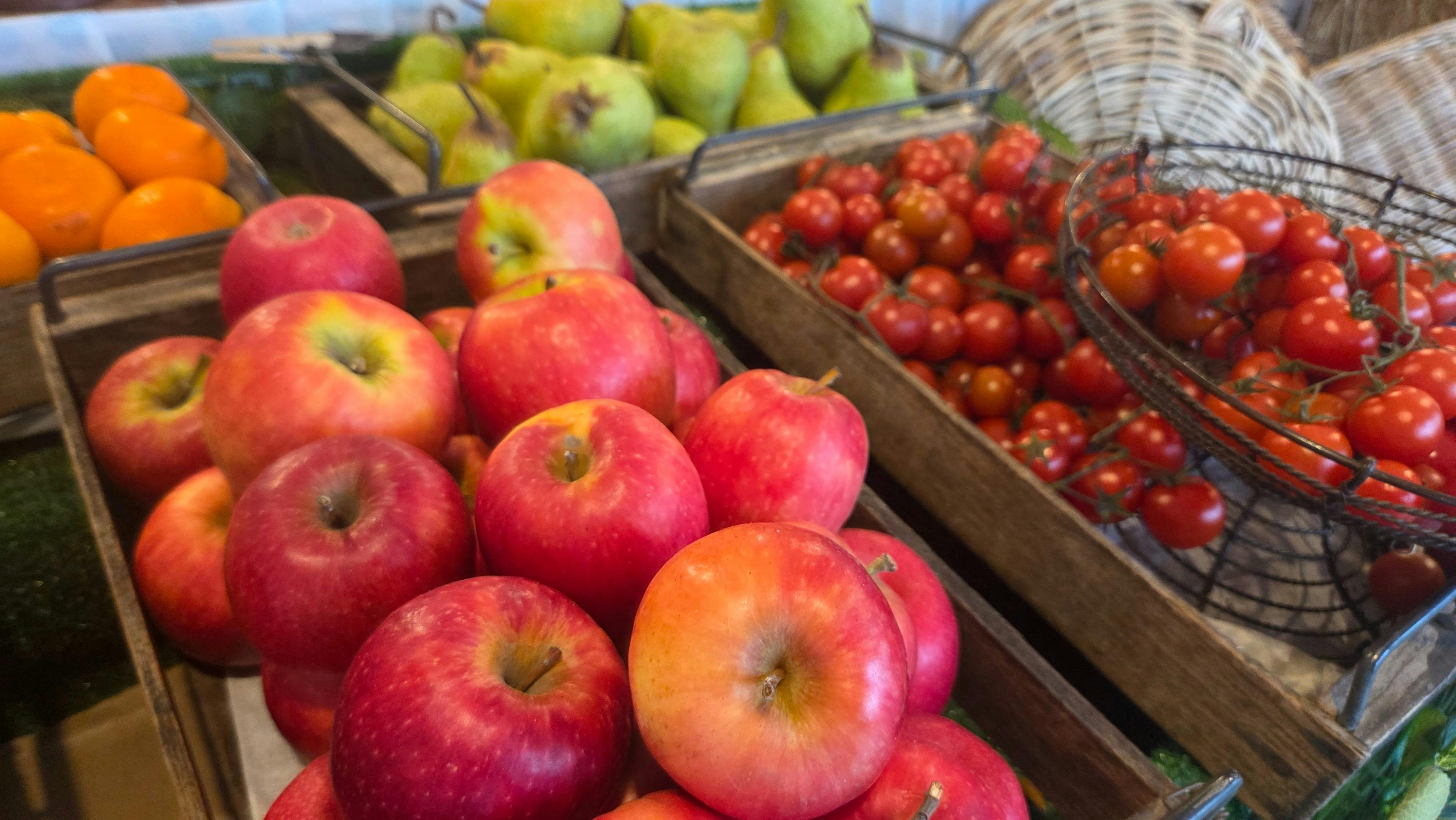 Fresh local produce, tomatoes and apples