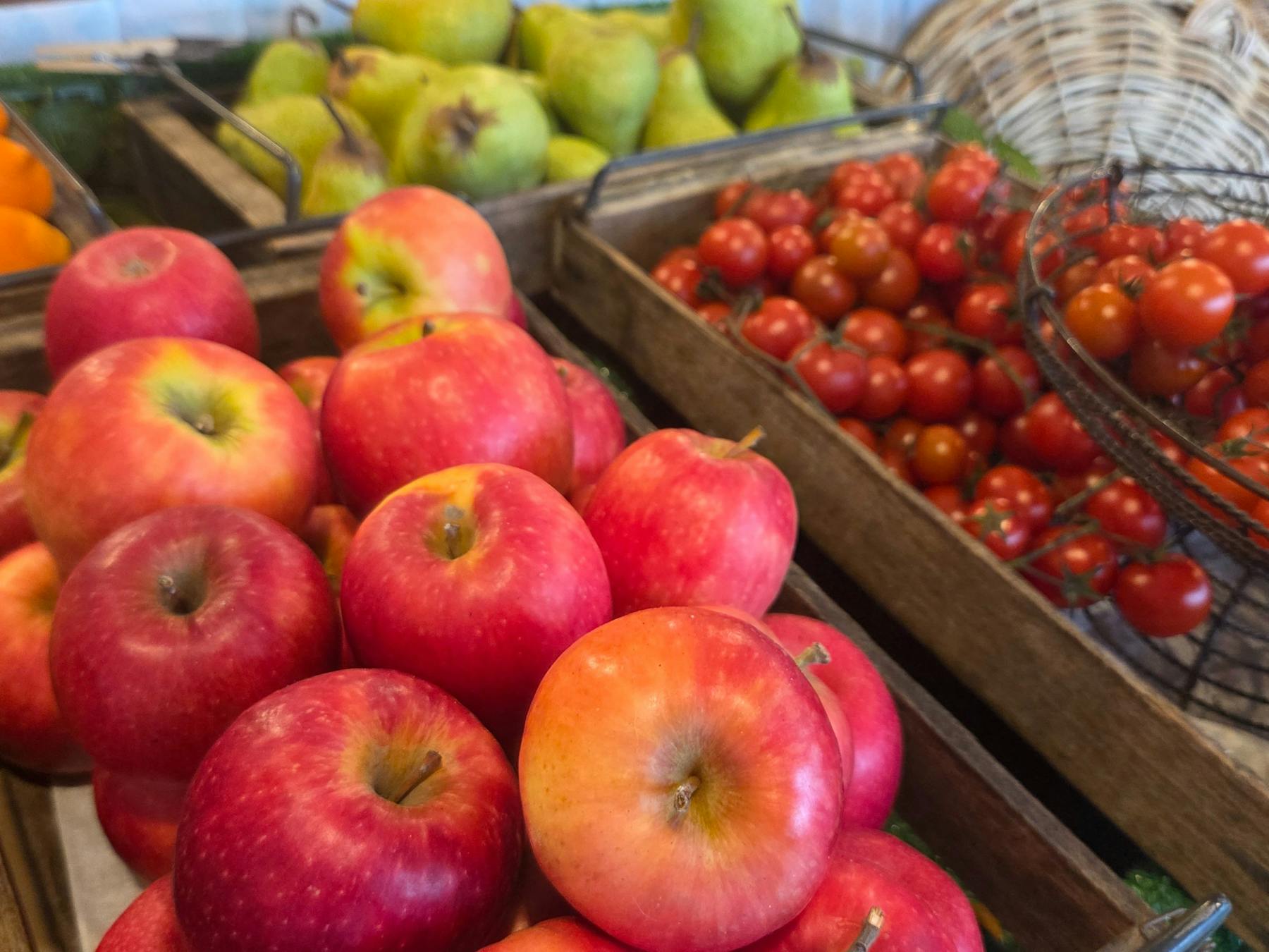 Fresh local produce, tomatoes and apples