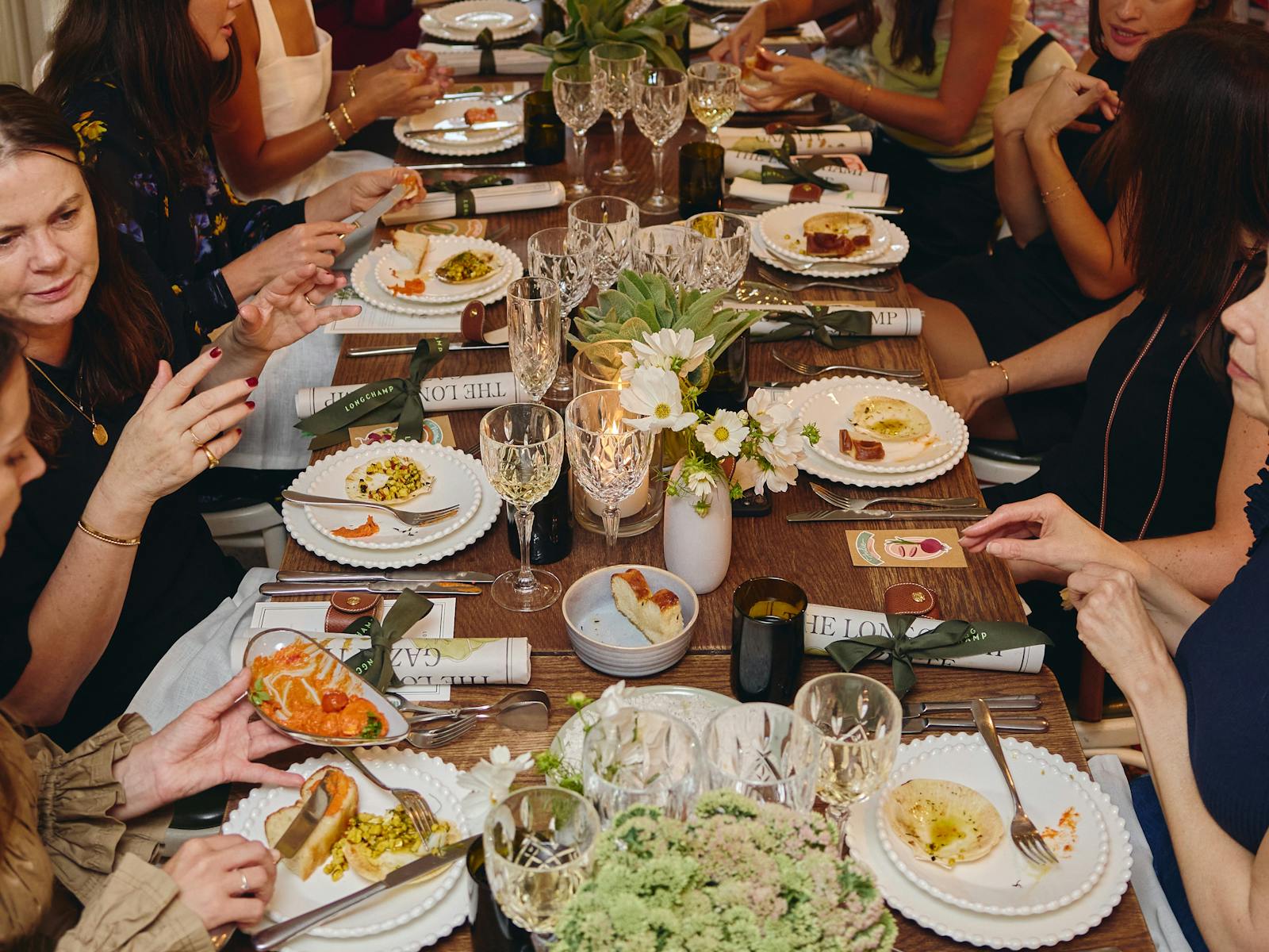 Long table full of food and drinks