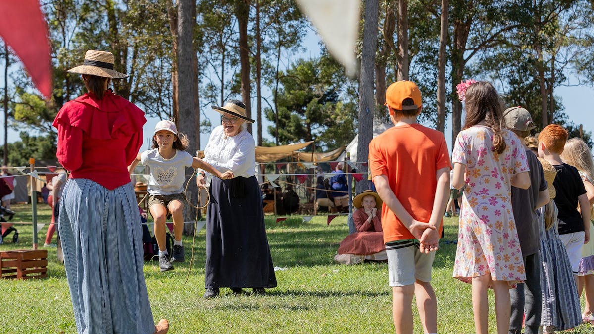 several children playing a jump rope game